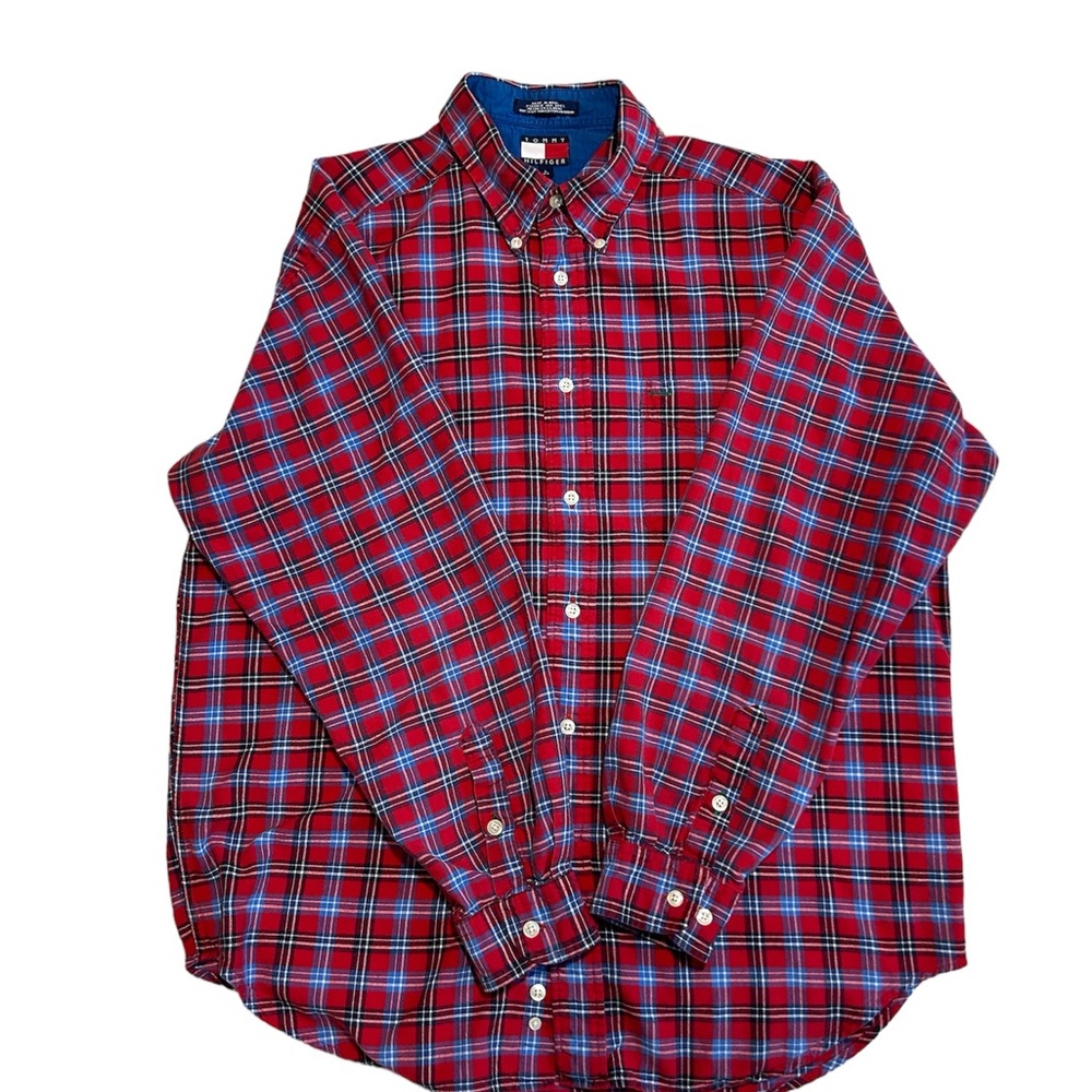 This is a Tommy Hilfiger Red Plaid Button Down Shirt. Men’s size Large.